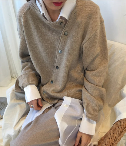 Cardigan i kashmir med knaplukning