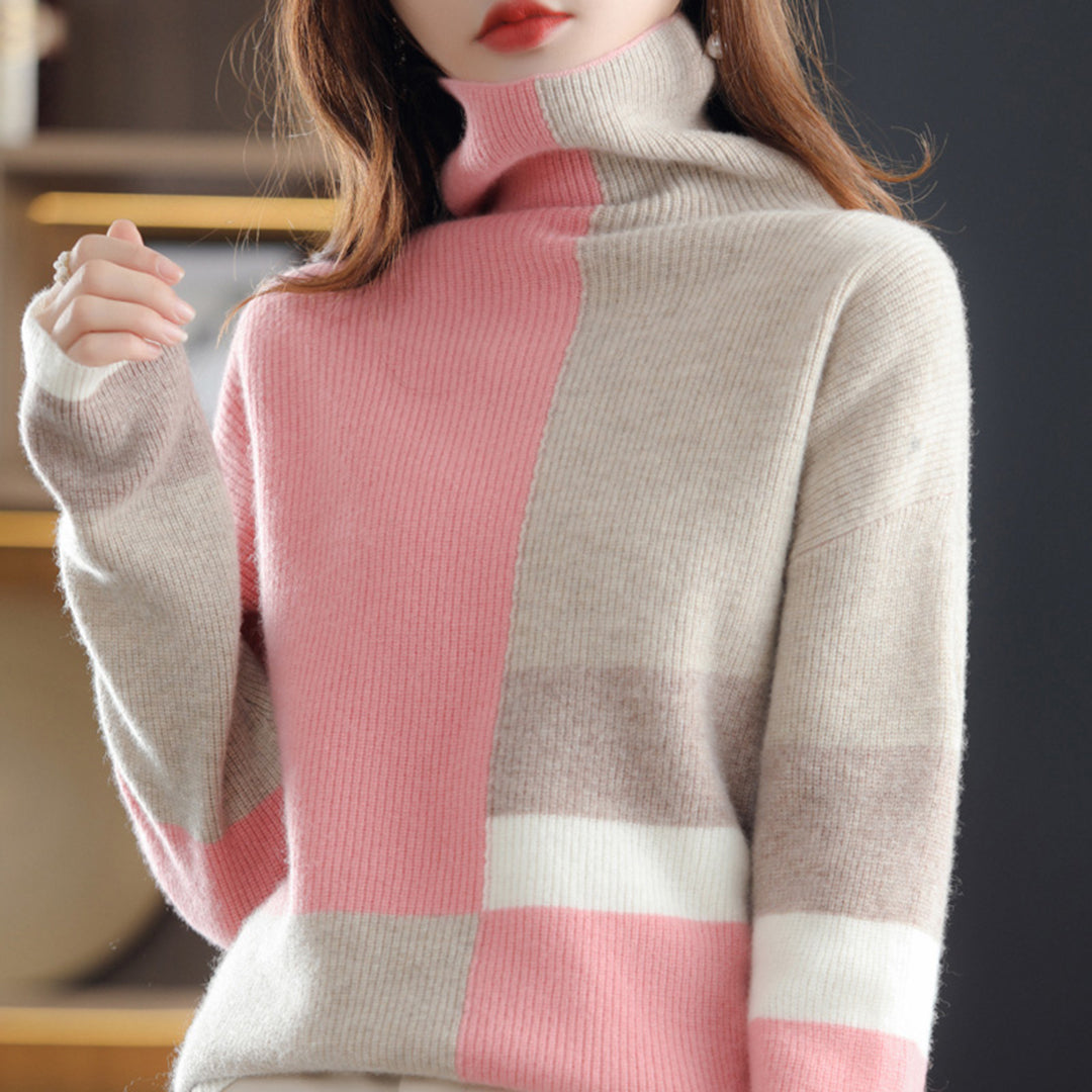 Rullekravesweater med farveblokdesign