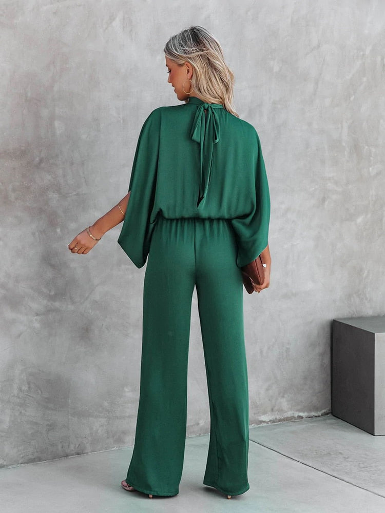 Elegant grøn jumpsuit med høj krave til kvinder