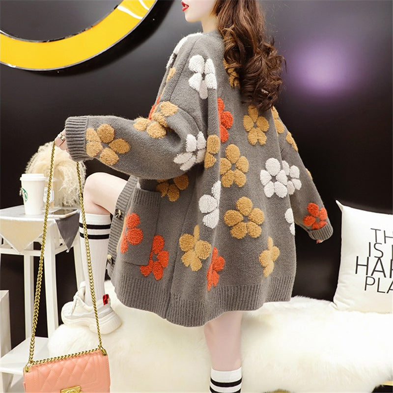 Sød blomsterstrikket sweater