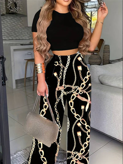 Sommersæt cropped t-shirt og blomstrede bukser til kvinder