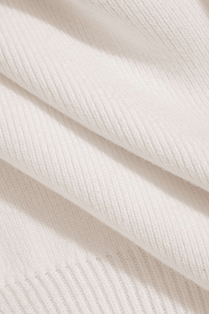 Chic strikcardigan med guldknapdetalje
